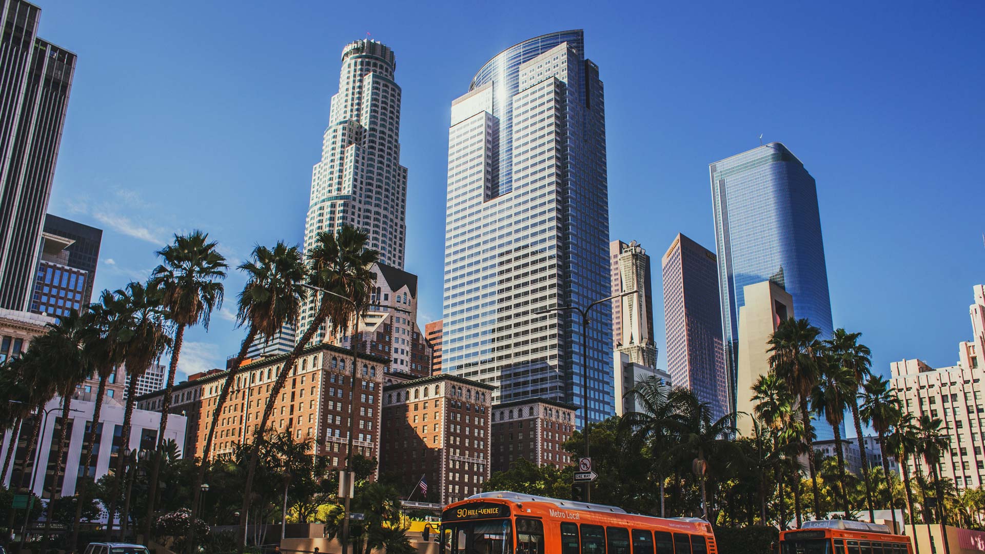 Landscape image of Los Angeles cityscape at street level view.